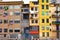 Colorful houses of Girona in center of city en embankment of Onyar River