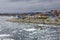 Colorful houses and icebergs floating in ocean in Ilulissat, Greenland