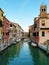 Colorful houses line the Water canal in Venice Italy