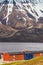 Colorful houses of Longyearbyen and snow capped mountains