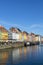 Colorful houses of Nyhavn waterfront, canal and entertainment district in Copenhagen, Denmark