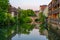 Colorful houses on shore of river Pegnitz in Central Nurnberg, G