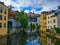 Colorful houses at the sides of the Alzette river in old town Grund district of Luxembourg City, Luxembourg, with beautiful