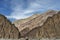 Colorful huge rocky mountain walls of majestic Himalayas