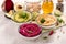 Colorful hummus, different dips, vegan snack, beetroot and avocado hummus, vegetarian eating