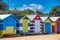 Colorful huts in Brighton Beach on a sunny morning, Australia