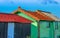 Colorful huts of fishermen against clear sky