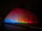 Colorful illuminated water fountains light art installation Circuito magico del Agua in Parque de la Reserva Lima Peru