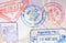 Colorful immigration arrival stamps on passport