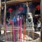Colorful incense in a burner in front of Nanputuo Buddhist Temple in Xiamen city, China