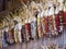 Colorful Indian corn hanging on wooden wall.