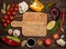Colorful ingredients for cooking on rustic wooden table around e
