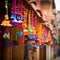 colorful and intricate decorations used to adorn homes and streets during Holi festivities.