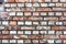 Colorful irregular brick wall texture or background