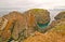 Colorful Jagged Rocks on an Ocean Coast