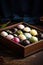 Colorful Japanese mochi dessert inside wooden box.