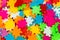 Colorful jigsaw puzzle close up.