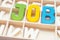Colorful Job wording - text uppercase letter made from wood in t
