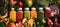 Colorful juices in bottles with fruit, vegetables and greens around