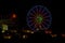 Colorful July 4th Ferris Wheel and Carnival at Night