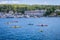Colorful kayakers paddle in Boothbay Harbor, Maine