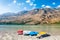 Colorful kayaks on the coast of lake.