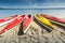 Colorful kayaks moored on lakeshore, Goldopiwo Lake, Mazury, Pol