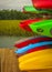 Colorful kayaks stacked up on a rack on wharf at Hilton Head Island dock on water