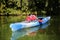 Colorful kayaks on the tropical beach.