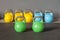 colorful kettlebells in a row in a gym - focus on the front kettle bell