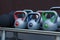 Colorful kettlebells weight on gym stand, background.