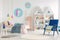 Colorful kid`s bedroom interior with a unicorn and ice-cream pos