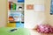 Colorful kids room with white bookcase