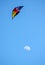 Colorful kite over the moon