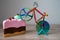 colorful knife cutter in shape bicycle on bright birthday piece of sponge cake, cut a cake