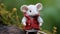 Colorful Knitted Mouse In Red Vest Sitting On Green Grass