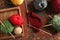 Colorful knitting yarn with unfinished clothes on table