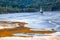 Colorful landscape of a flooded church in toxic polluted lake due to copper mining