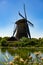 Colorful landscape in Netherlands, Europe. Famous windmills in Kinderdijk village