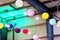 Colorful lantern lampions hanging on a ceiling