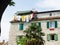 Colorful laundry drying on balcony of Mediterranean house