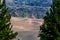 Colorful lava beds and cinder cones left by volcano make bleak landscape in Lassen National Volcanic Park