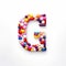 Colorful Letter G Made Of Pills: Whimsical Still Life Illustration