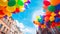 Colorful LGBTQ pride parade balloons floating