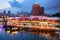 Colorful light building at night in Clarke Quay, Singapore. Clarke Quay, is a historical riverside quay in Singapore.