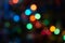 Colorful light bulbs and vivid round bokeh lights tree festive mood lightning