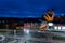 Colorful light stripes of cars on the street at night in front of a church in the city of plauen