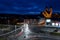 Colorful light stripes of cars on the street at night in front of a church in the city of plauen