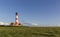 Colorful lighthouse at Westerhever, Germany