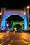 Colorful lights on Grunwald Bridge in the evening.